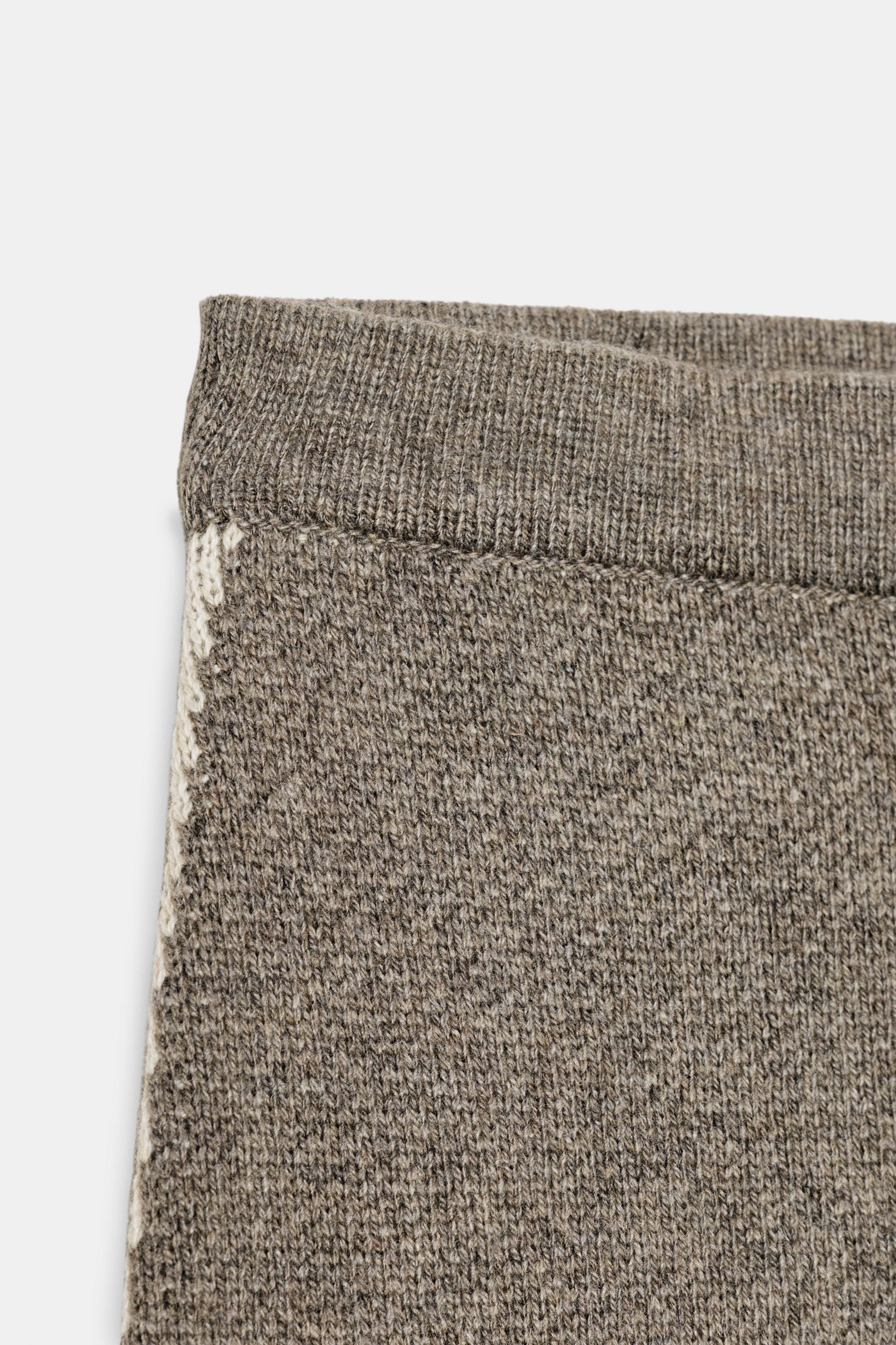 JUPE MI-LONGUE EN MAILLE À LISERÉS CONTRASTANTS